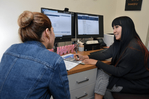 Faculty assisting a student